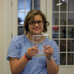 VOLUNTEER: Maya Shome pictured holding her award as MedWish International's 2023 Kayla N. Schwartz Award Recipient.